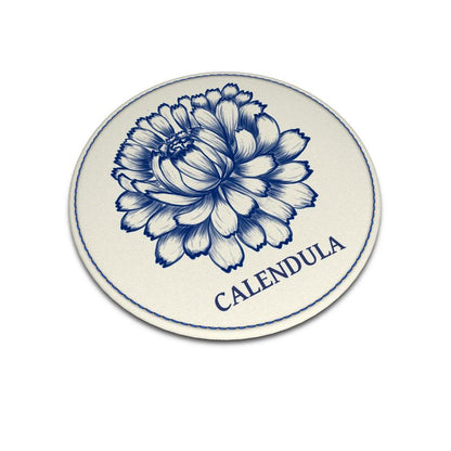 Leather Coaster Featuring Calendula from the Plan C Collection